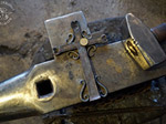 Kreuz auf dem Amboss